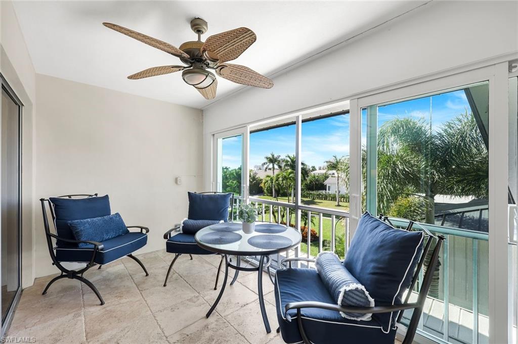 4200 Belair Lane, Unit 316 Naples, FL 34103 - Photo 16 of 18 a view of a livingroom with furniture