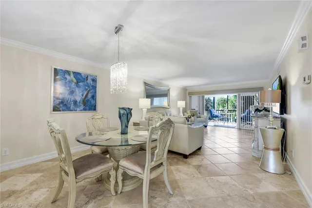 a dining room with furniture window fire place