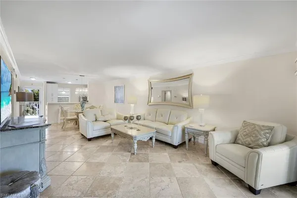 a living room with furniture and a couch