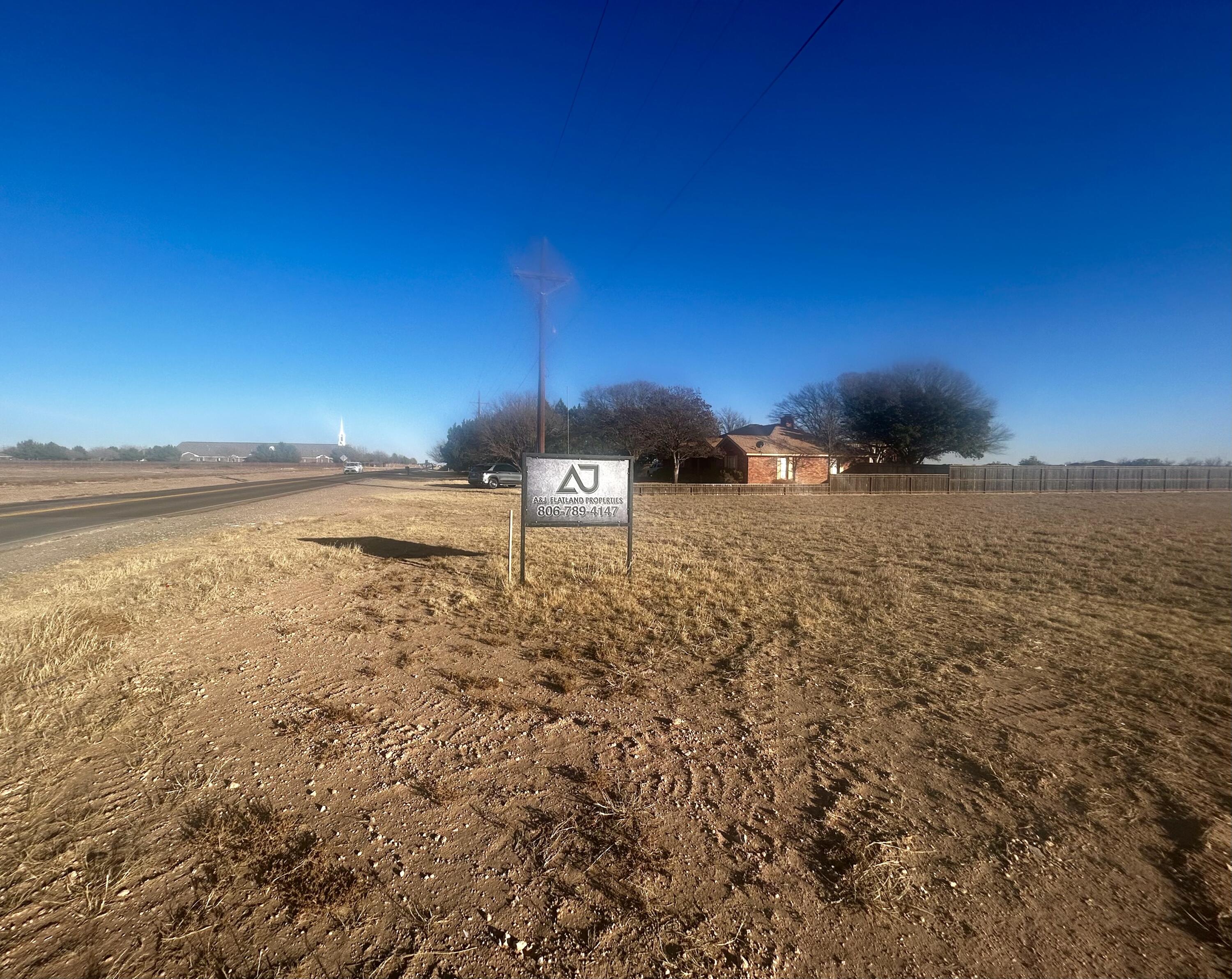 6415 114th Street Lubbock, TX 79424 - Photo 2 of 3 a view of a lake with sunset