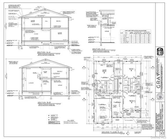 a black and white photo of a living room