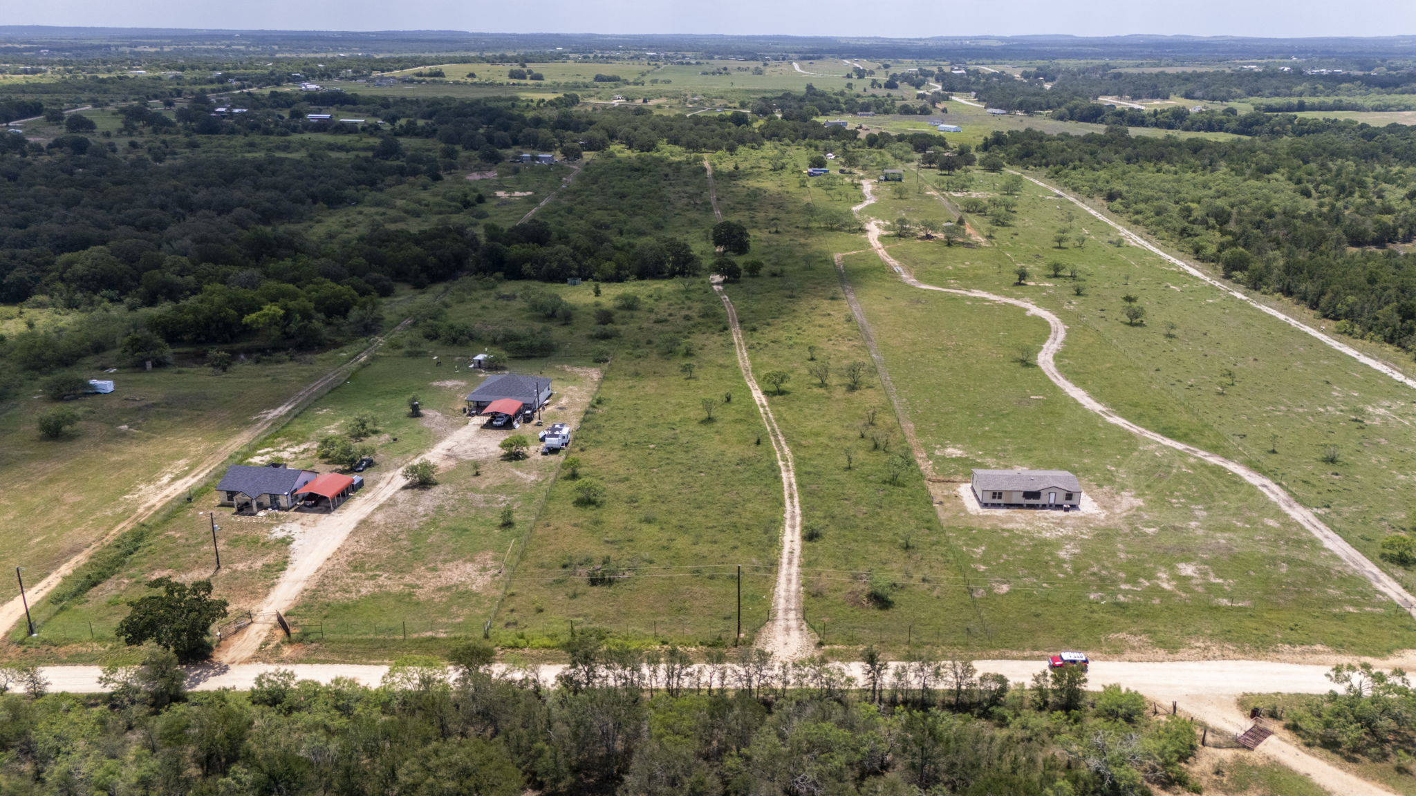 401 Turnback Trail Dale, TX 78616 - Photo 16 of 34 an aerial view of residential houses with outdoor space