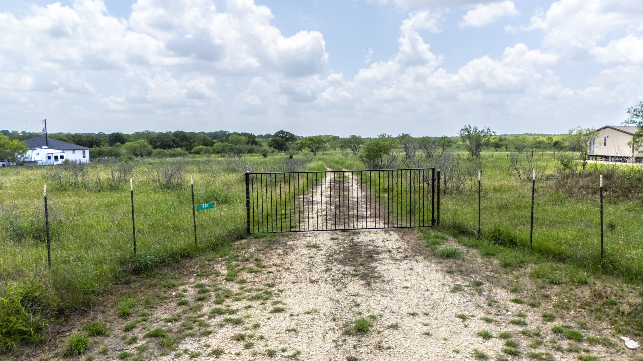 401 Turnback Trail Dale, TX 78616 - Photo 2 of 34 a view of a lake with a big yard