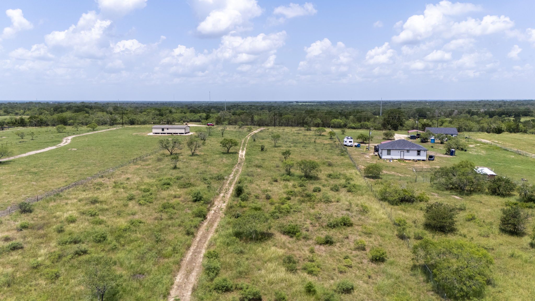 401 Turnback Trail Dale, TX 78616 - Photo 28 of 34 a view of a lake with houses in the back