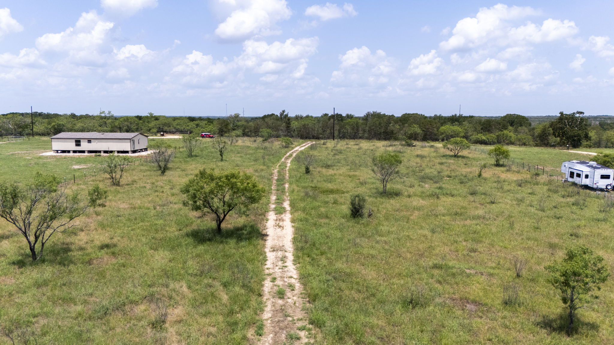 401 Turnback Trail Dale, TX 78616 - Photo 29 of 34 a view of a lake with houses