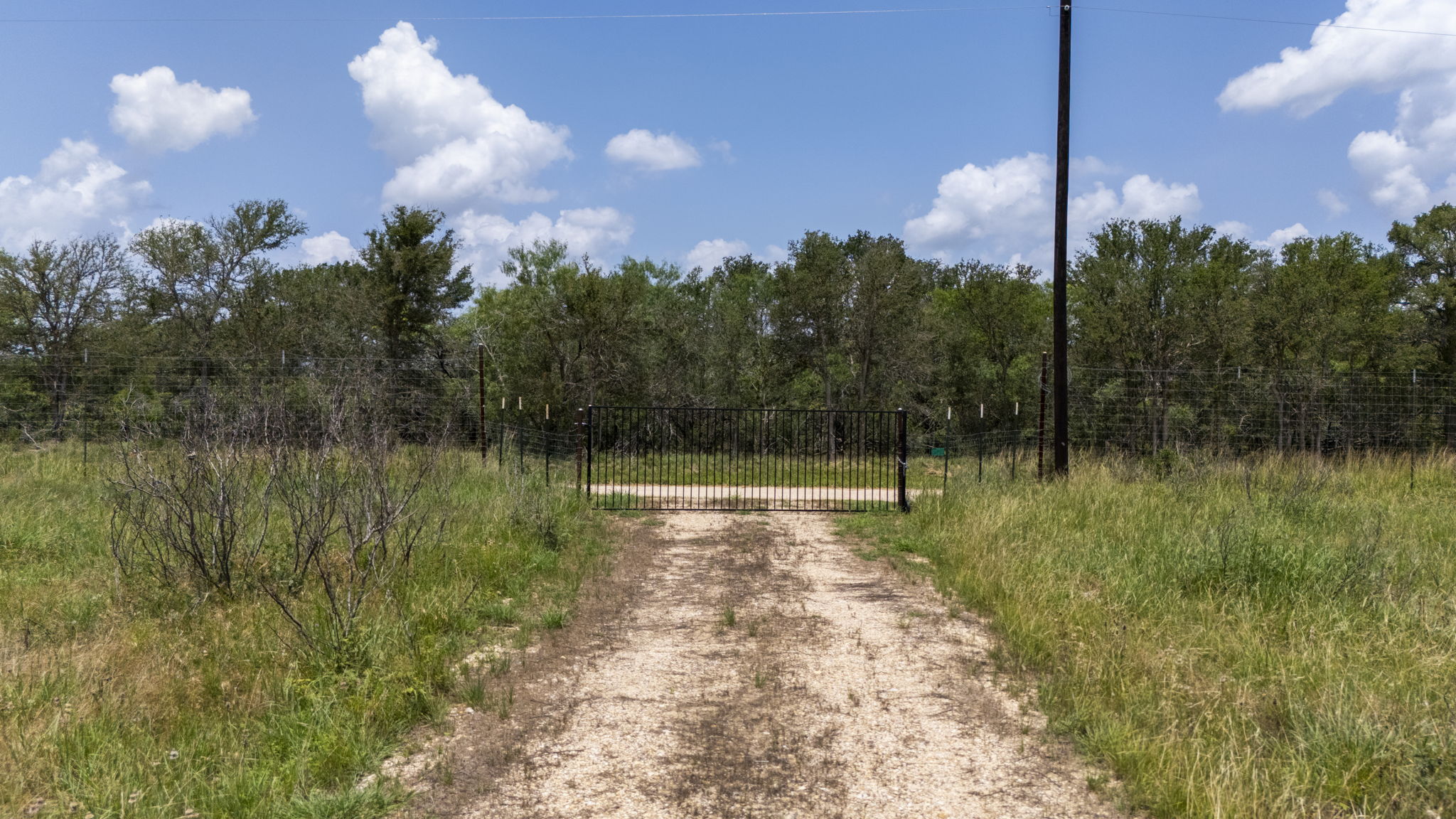 401 Turnback Trail Dale, TX 78616 - Photo 31 of 34 a view of a lake with a yard