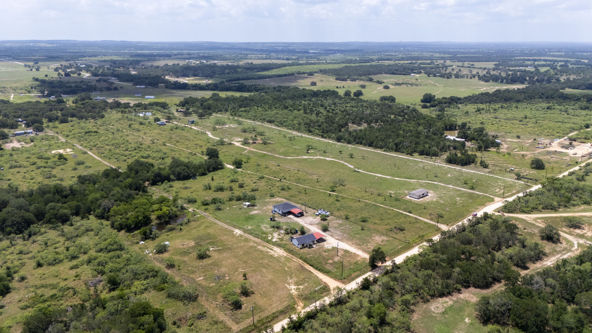 401 Turnback Trail Dale, TX 78616 - Photo 4 of 34 an aerial view of residential houses with outdoor space