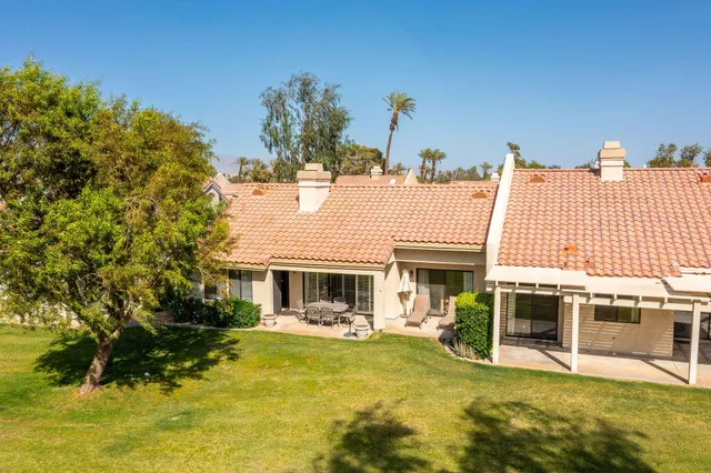 a view of a house with a swimming pool