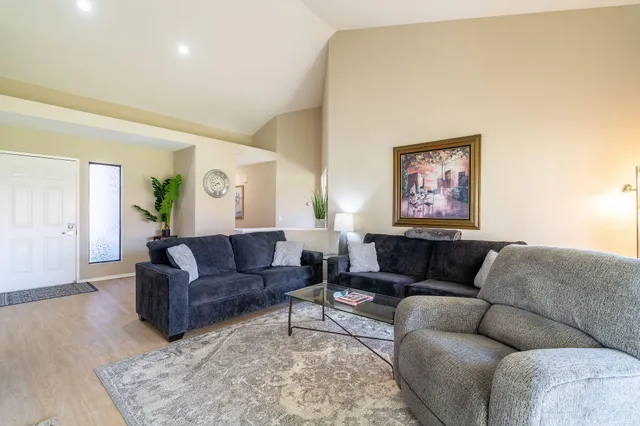 a living room with furniture and a couch