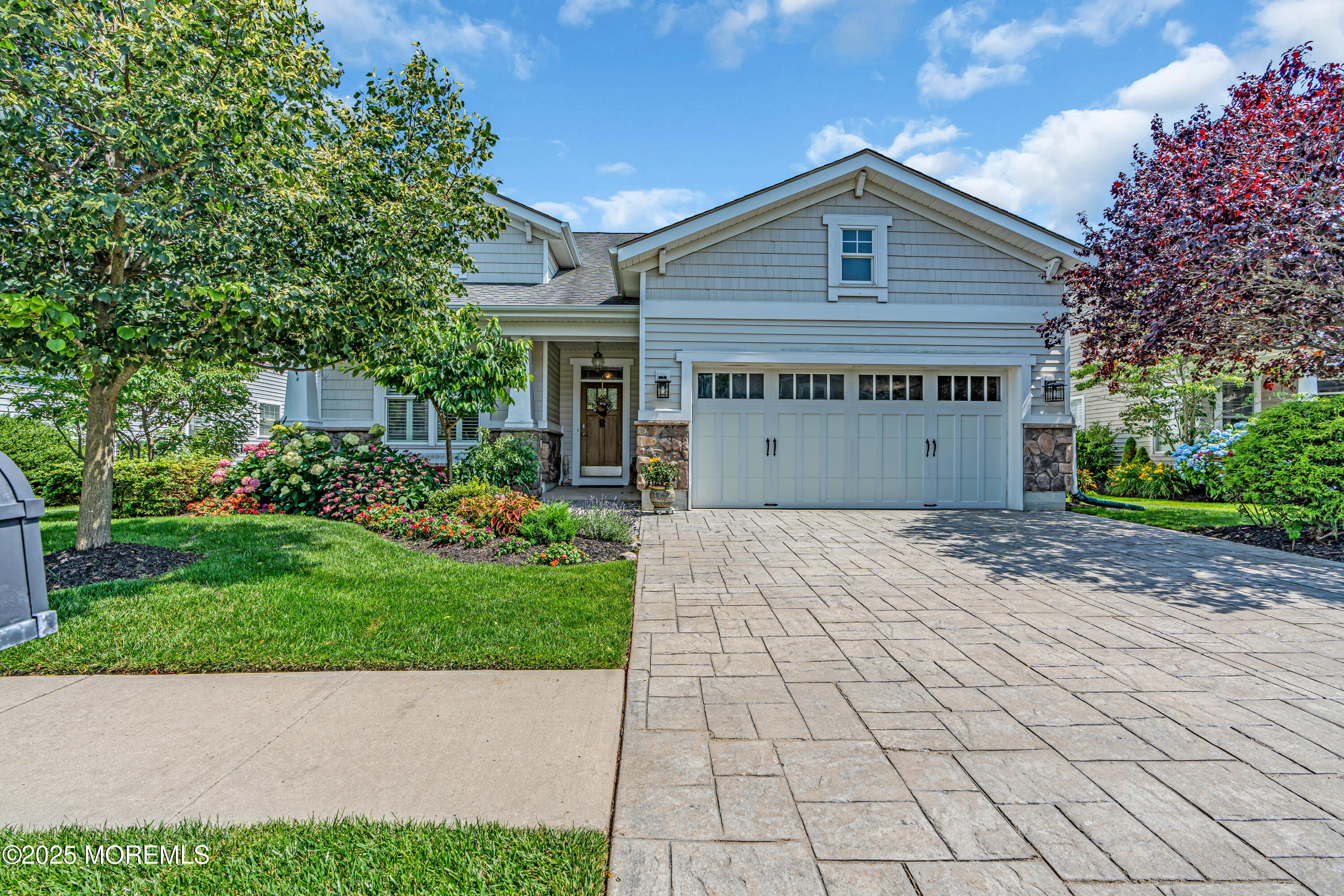 16 Haskell Way Oceanport, NJ 07757 - Photo 1 of 43 a front view of a house with a garden