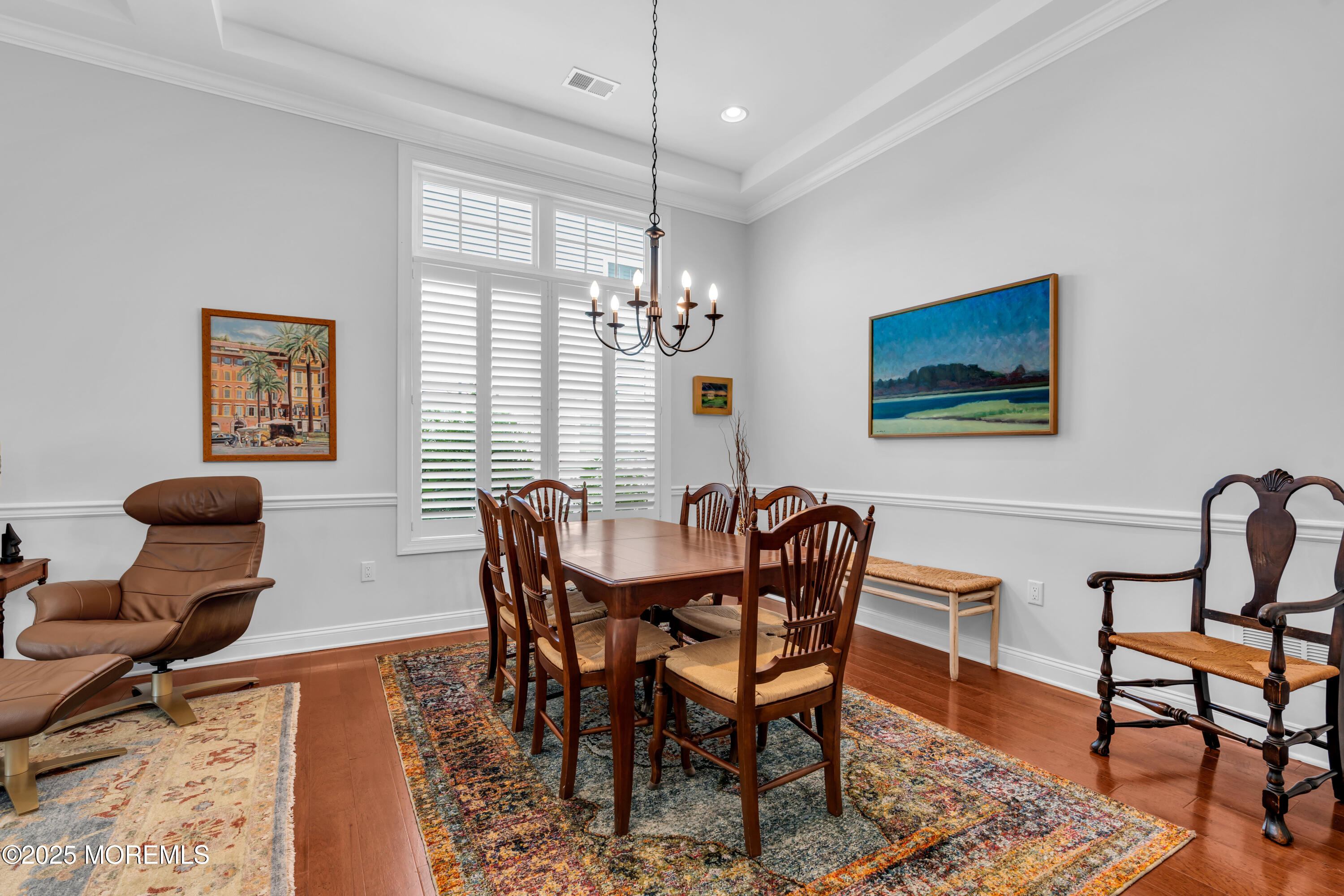 16 Haskell Way Oceanport, NJ 07757 - Photo 13 of 43 a dining room with furniture a rug and a chandelier