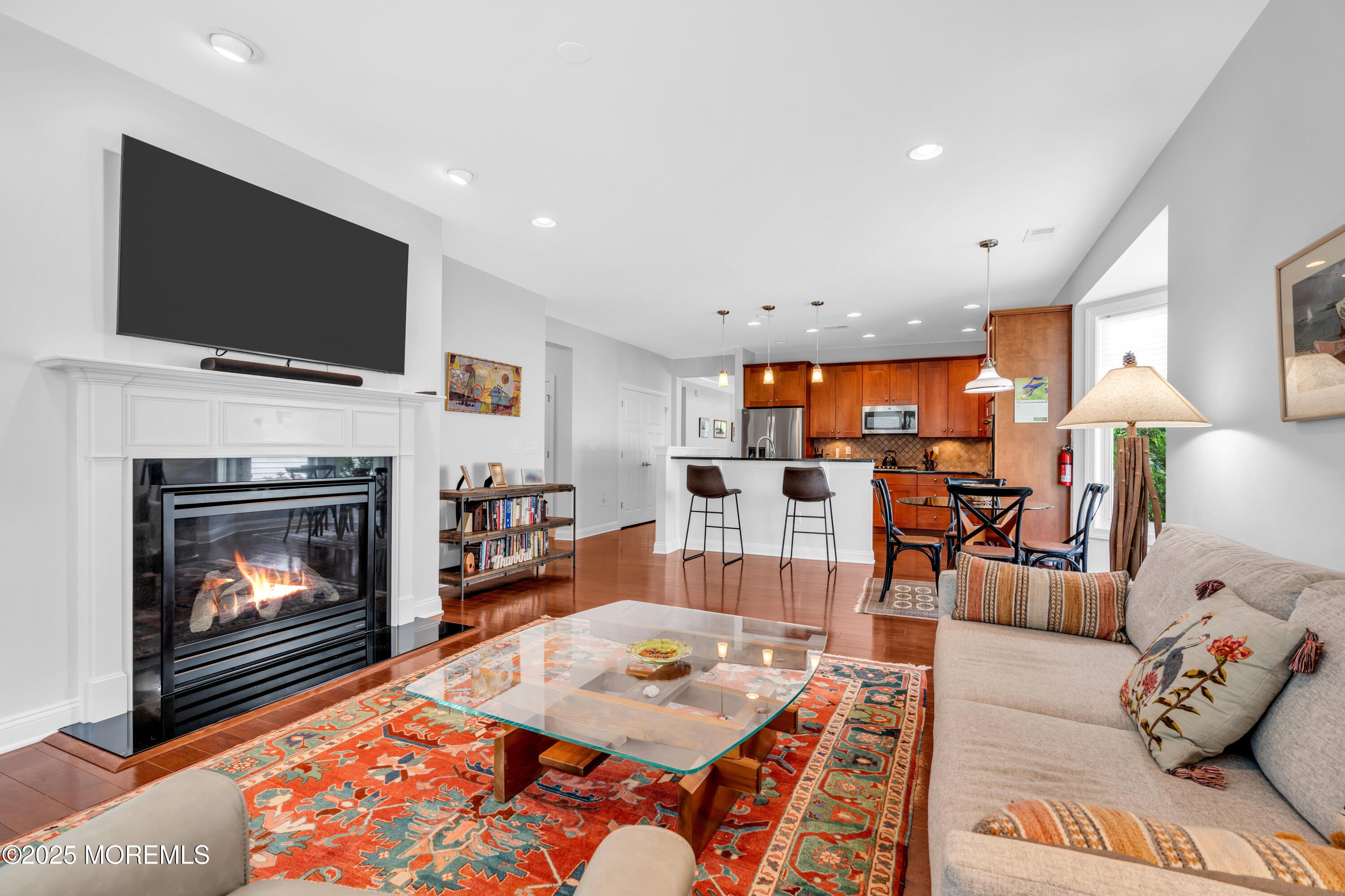 16 Haskell Way Oceanport, NJ 07757 - Photo 23 of 43 a living room with furniture and a flat screen tv