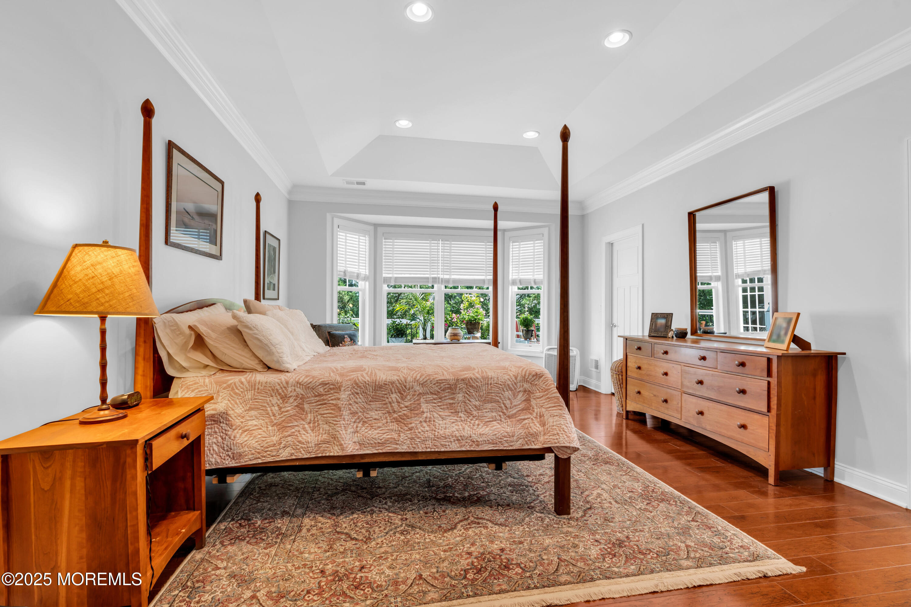 16 Haskell Way Oceanport, NJ 07757 - Photo 31 of 43 a bedroom with a bed and wooden floor