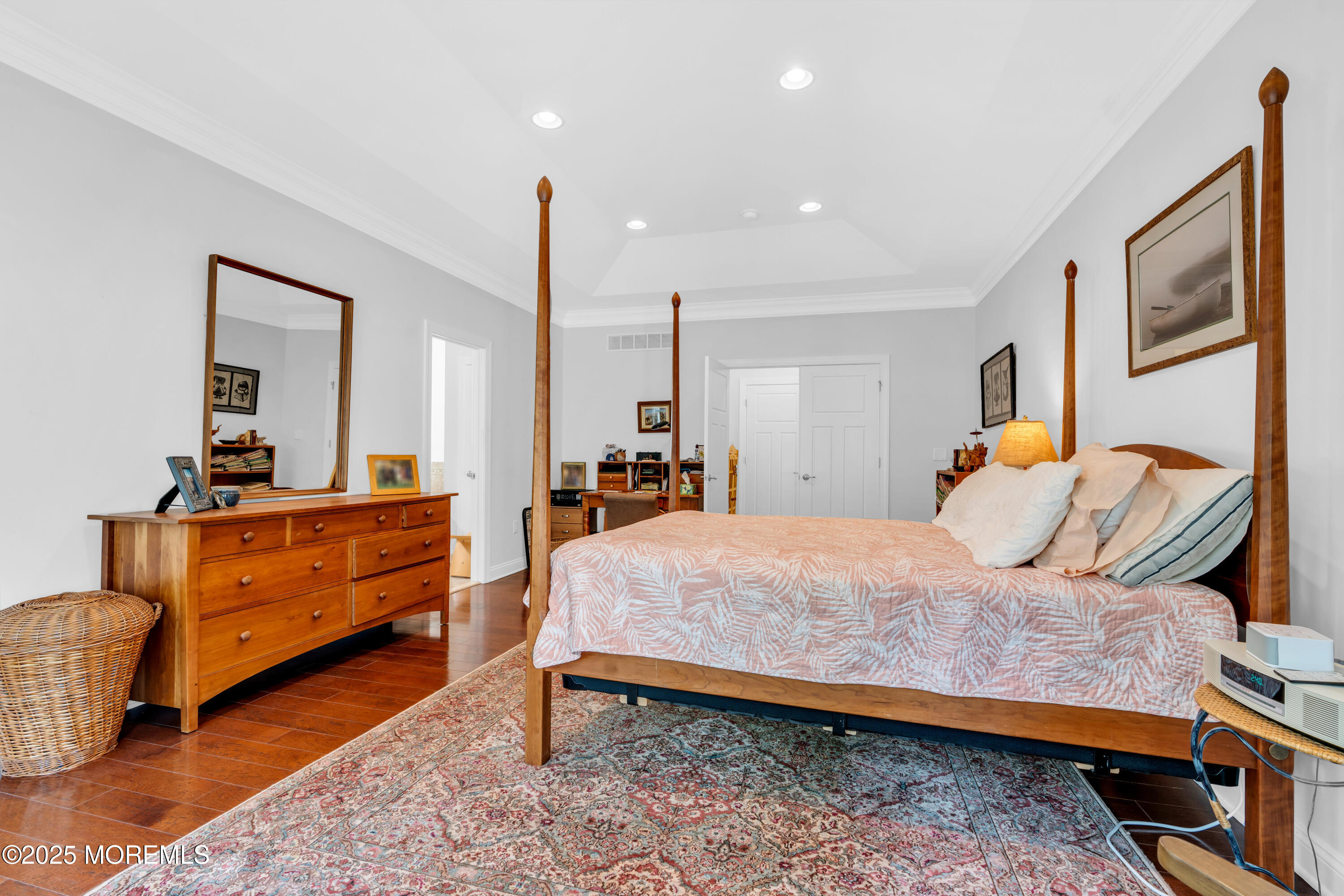 16 Haskell Way Oceanport, NJ 07757 - Photo 32 of 43 a bedroom with furniture and a dresser