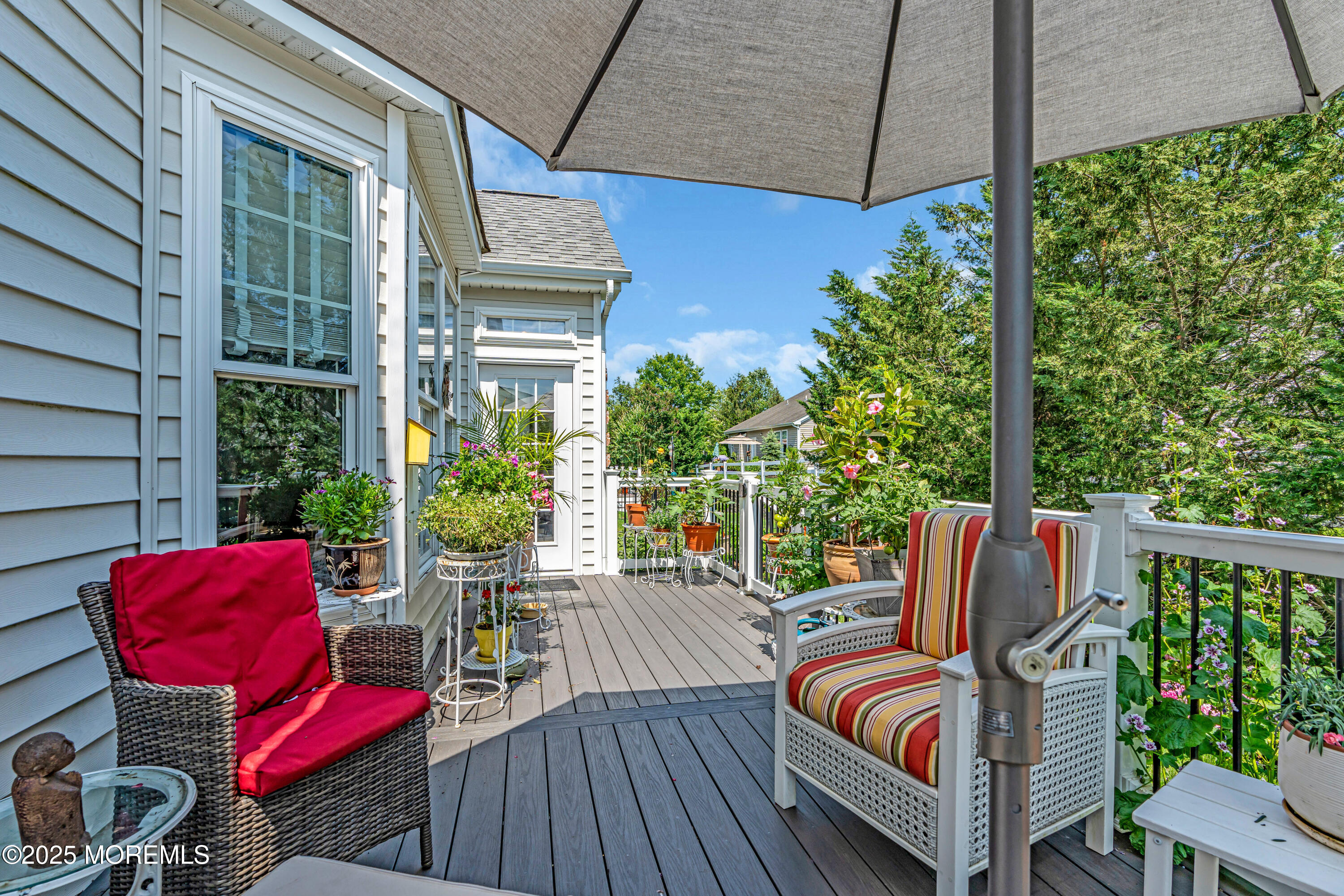 16 Haskell Way Oceanport, NJ 07757 - Photo 36 of 43 a view of a chair and tables in the balcony