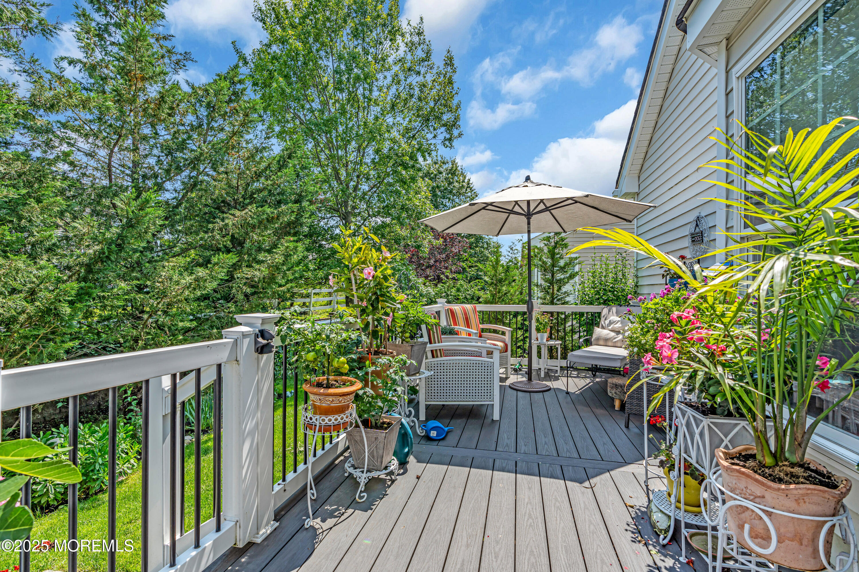 16 Haskell Way Oceanport, NJ 07757 - Photo 37 of 43 a view of balcony with outdoor seating and wooden floor