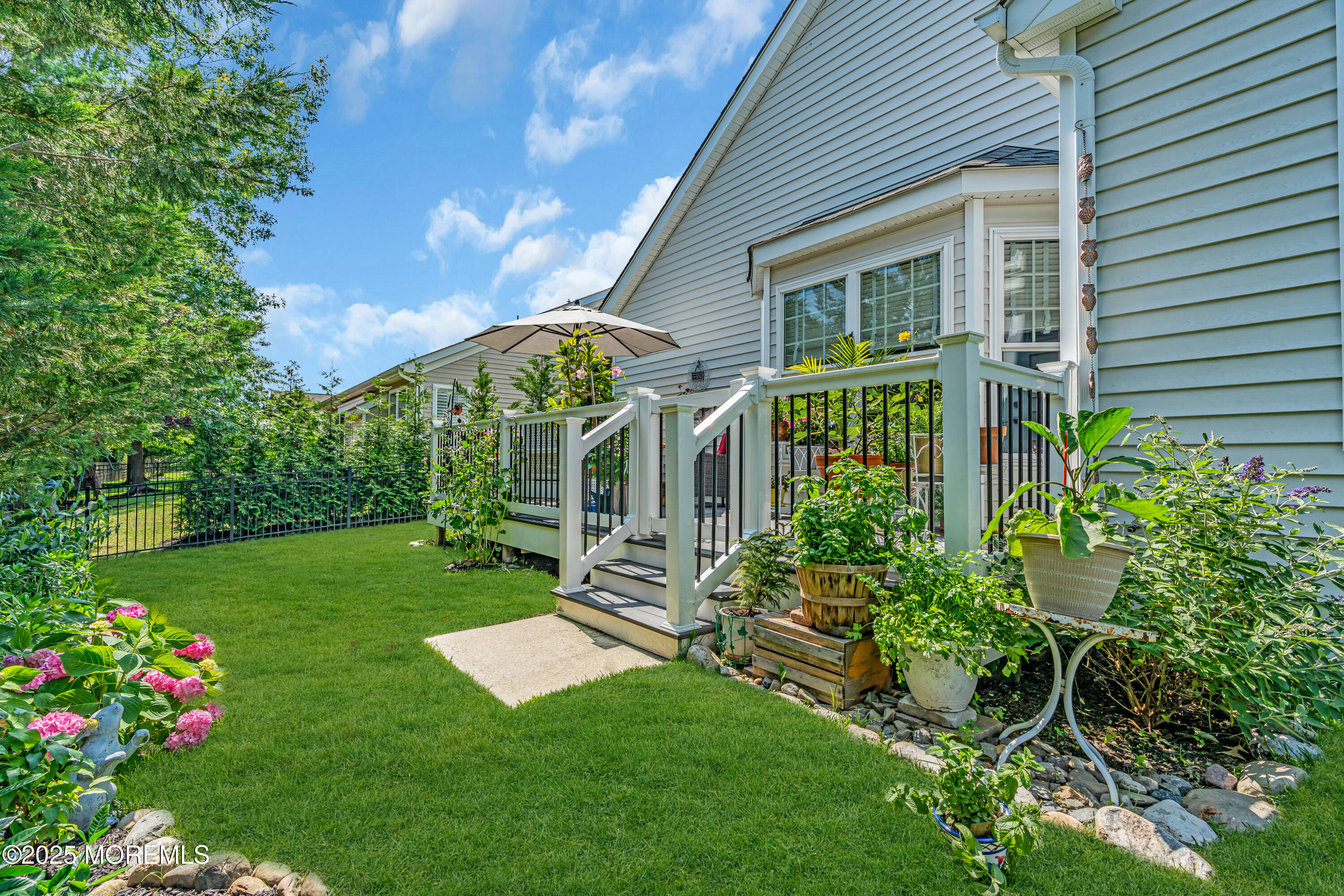 16 Haskell Way Oceanport, NJ 07757 - Photo 38 of 43 a view of a house with a yard and garden
