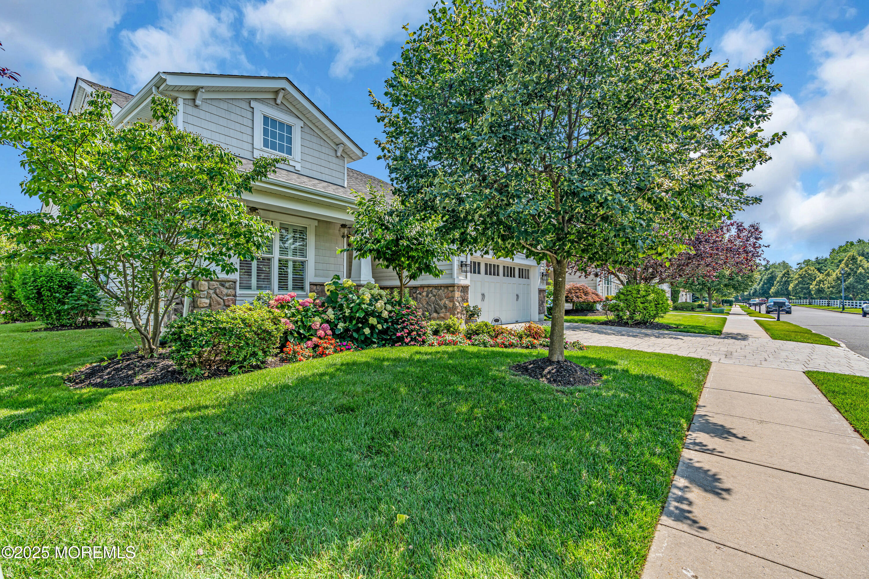 16 Haskell Way Oceanport, NJ 07757 - Photo 4 of 43 a front view of a house with garden