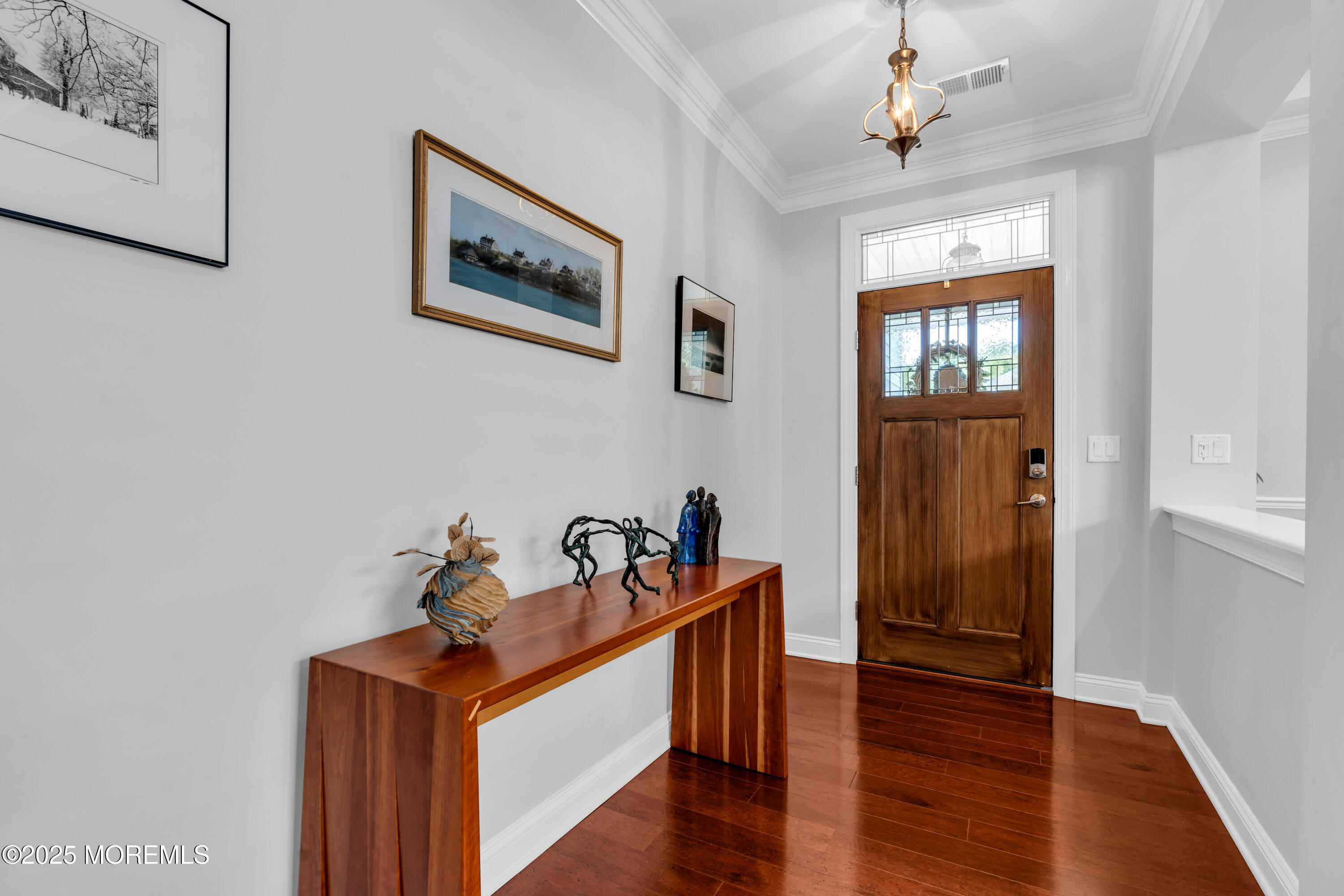16 Haskell Way Oceanport, NJ 07757 - Photo 7 of 43 a view of a hallway with entryway and wooden floor