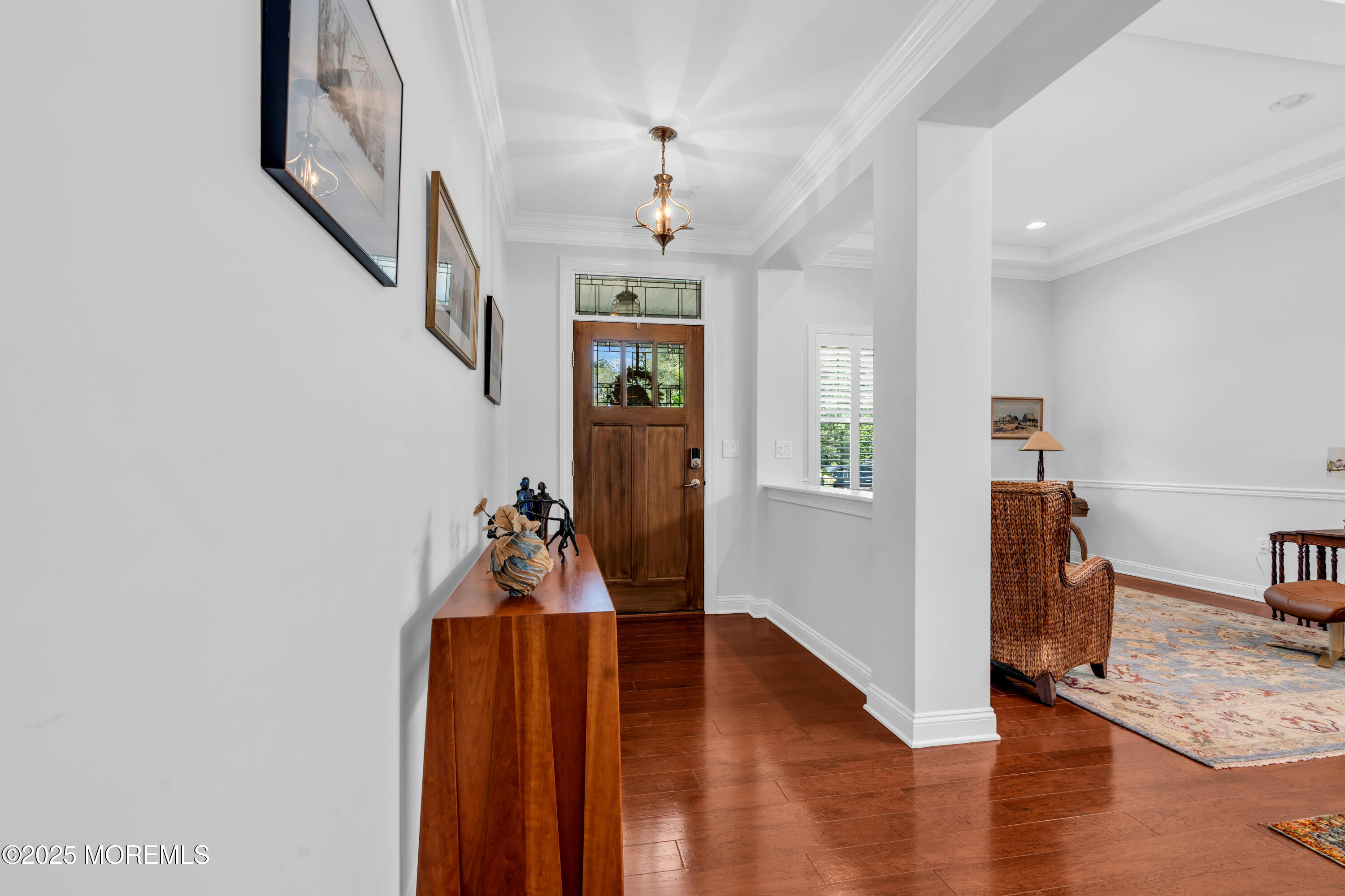16 Haskell Way Oceanport, NJ 07757 - Photo 8 of 43 a view of a livingroom with wooden floor and stairs