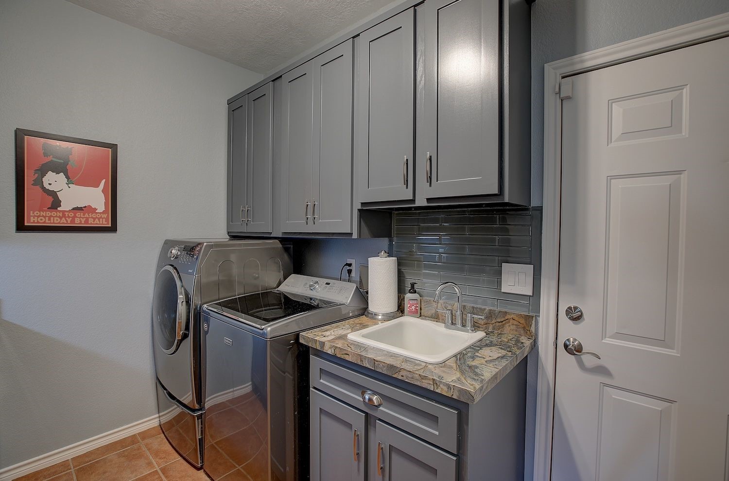 1928 Koether Road Carmine, TX 78932 - Photo 16 of 49 Utility room off the Kitchen area with a hidden wall cabinet ironing board. All appliances convey