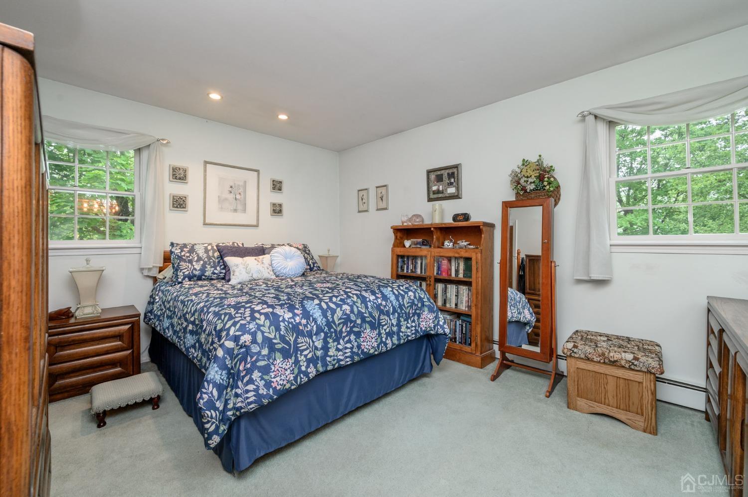 25 Sunset Drive Andover, NJ 07821 - Photo 19 of 43 a bedroom with a bed and a window