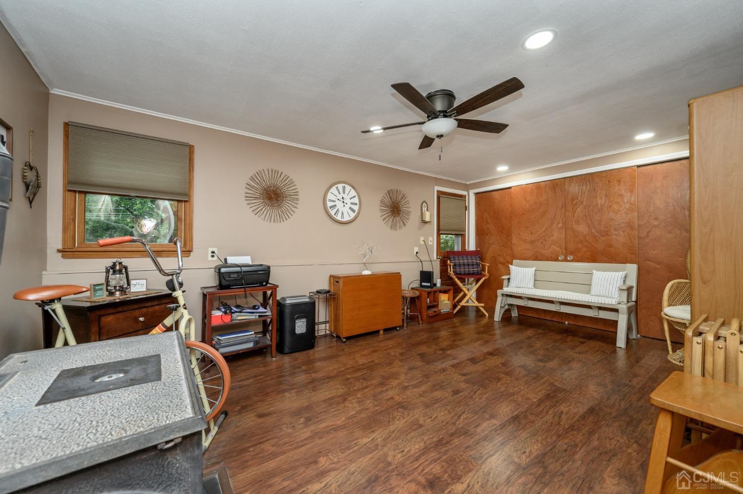 25 Sunset Drive Andover, NJ 07821 - Photo 26 of 43 a living room with furniture and a wooden floor