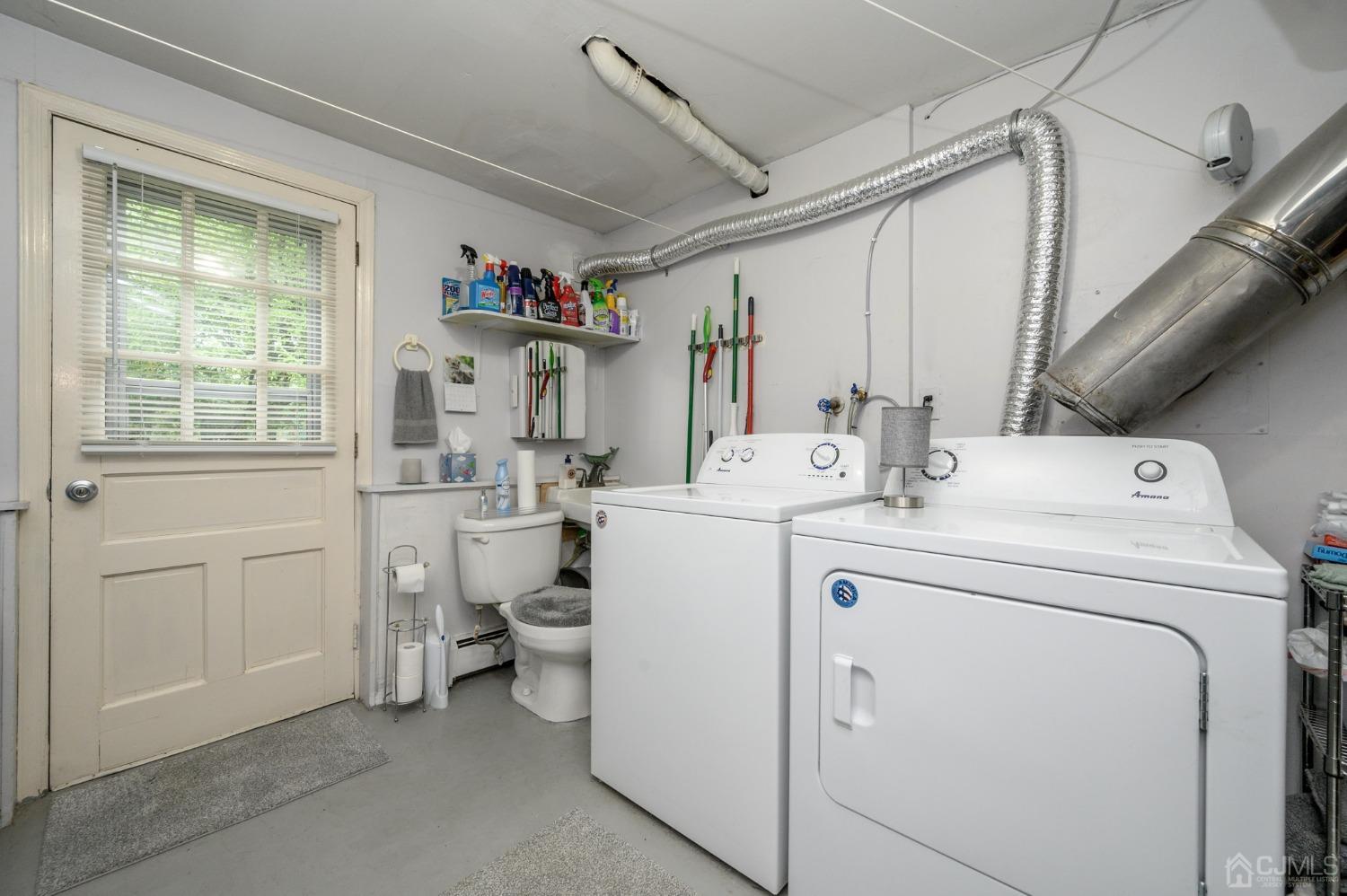 25 Sunset Drive Andover, NJ 07821 - Photo 27 of 43 a utility room with dryer and washer