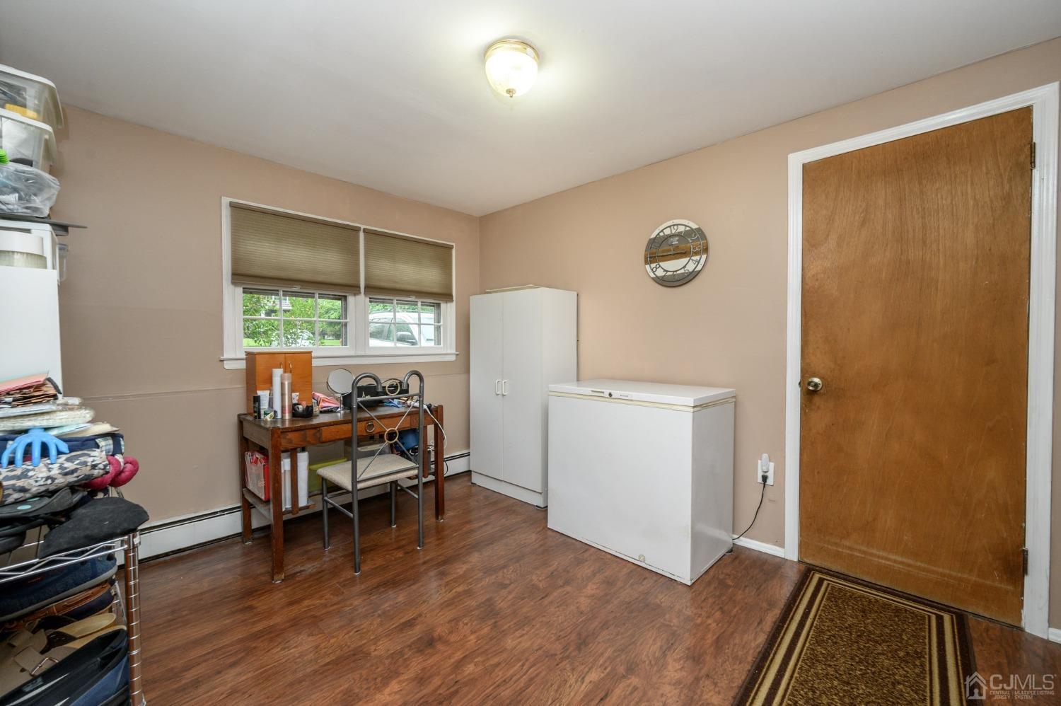 25 Sunset Drive Andover, NJ 07821 - Photo 29 of 43 a view of a workspace with furniture and a window