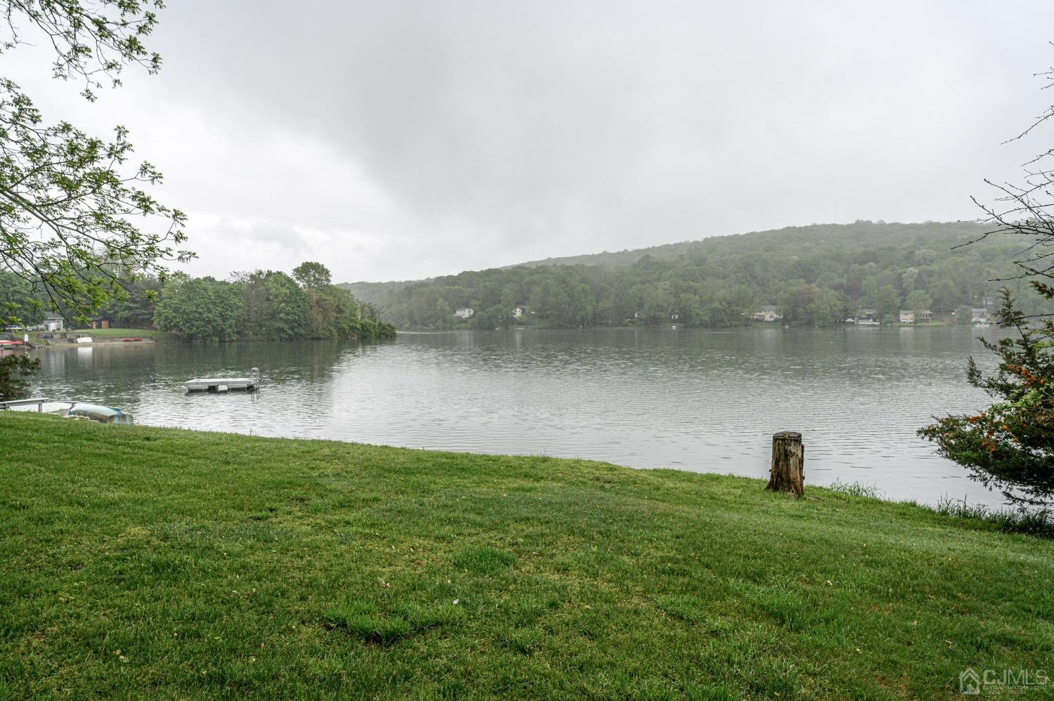 25 Sunset Drive Andover, NJ 07821 - Photo 39 of 43 a view of a lake with a yard