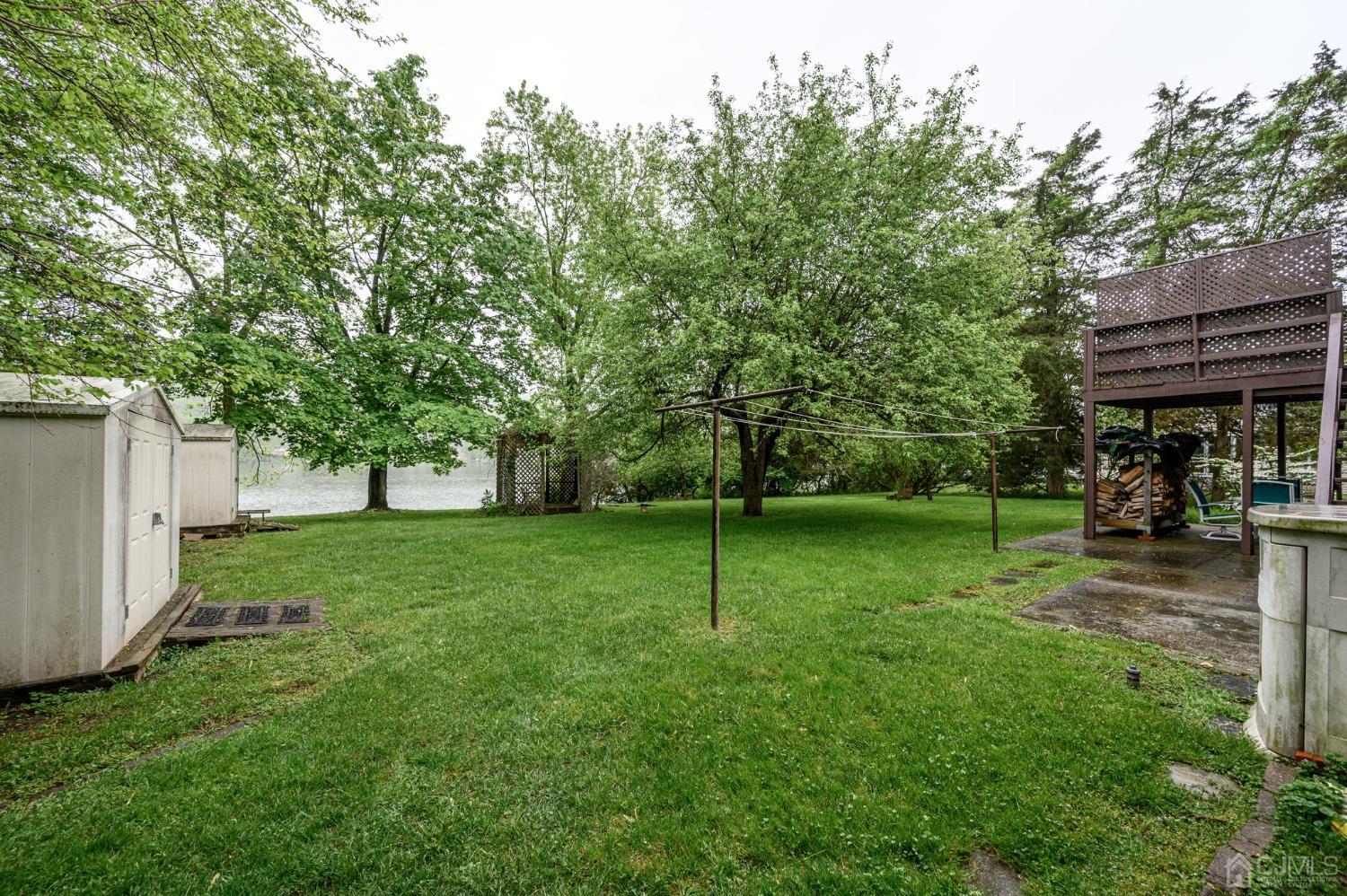 25 Sunset Drive Andover, NJ 07821 - Photo 41 of 43 a view of a backyard with tree s