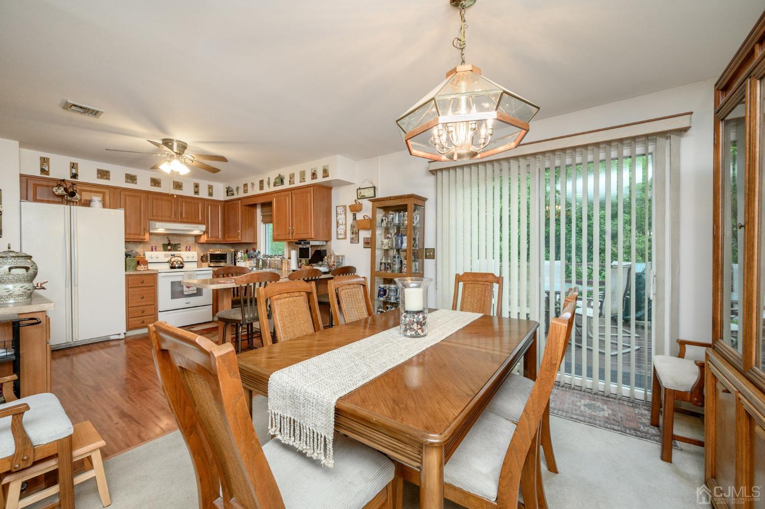 25 Sunset Drive Andover, NJ 07821 - Photo 7 of 43 a view of a dining room with furniture window and outside view