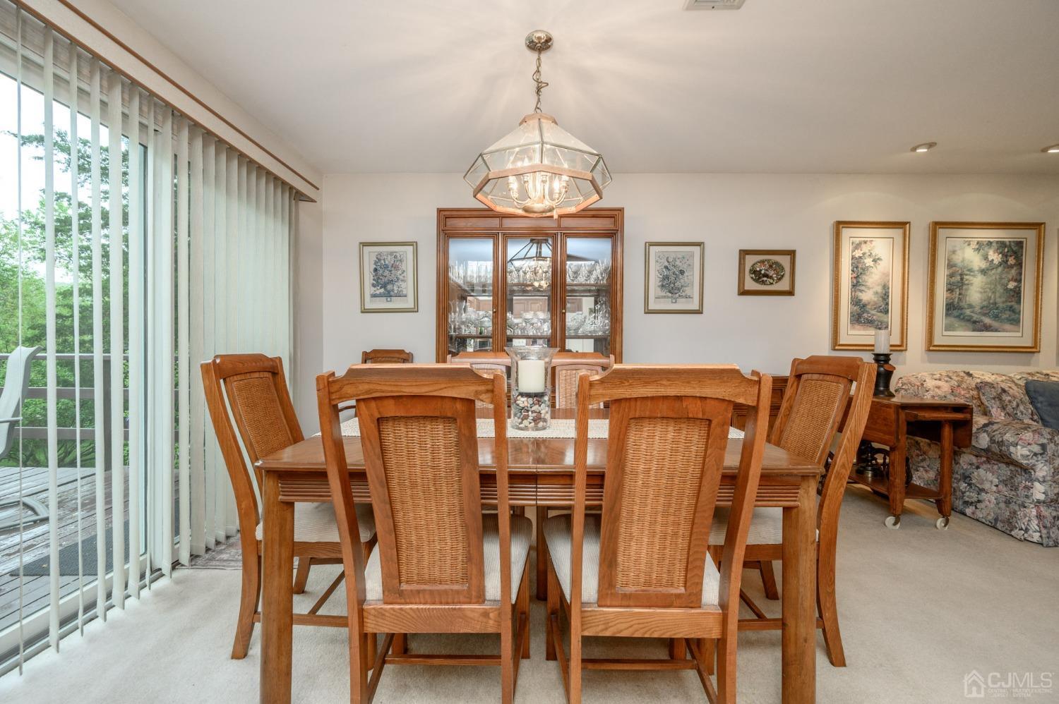 25 Sunset Drive Andover, NJ 07821 - Photo 9 of 43 a view of a dining room with furniture window and outside view