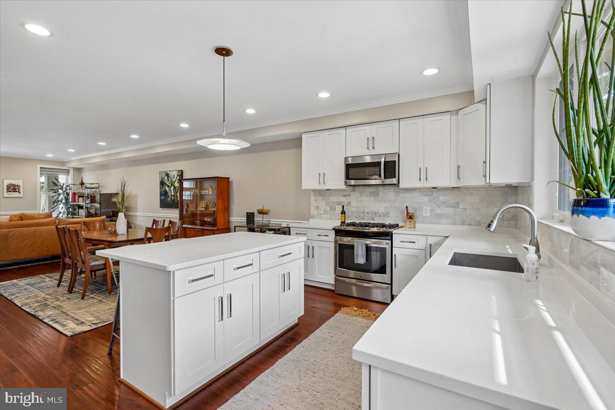 1203 Staples Street Northeast Washington, DC 20002 - Photo 11 of 51 Modern kitchen with open layout charm.