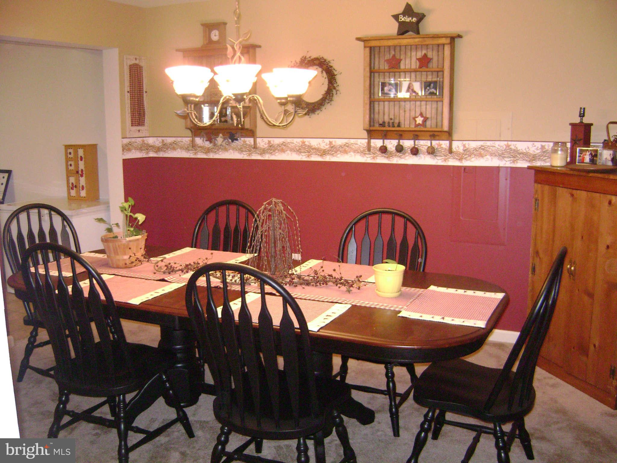 25252 Military Road Cascade, MD 21719 - Photo 8 of 26 a view of a dining room with furniture and window