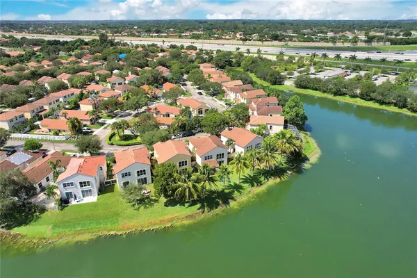 a lake view with a garden and a lake