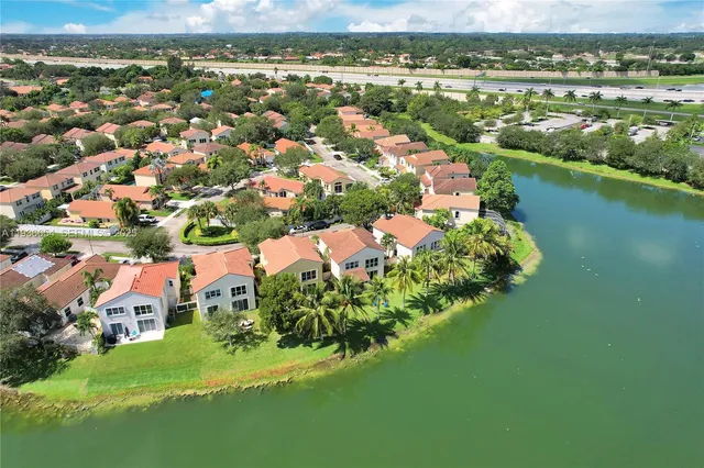 a lake view with a garden and a lake