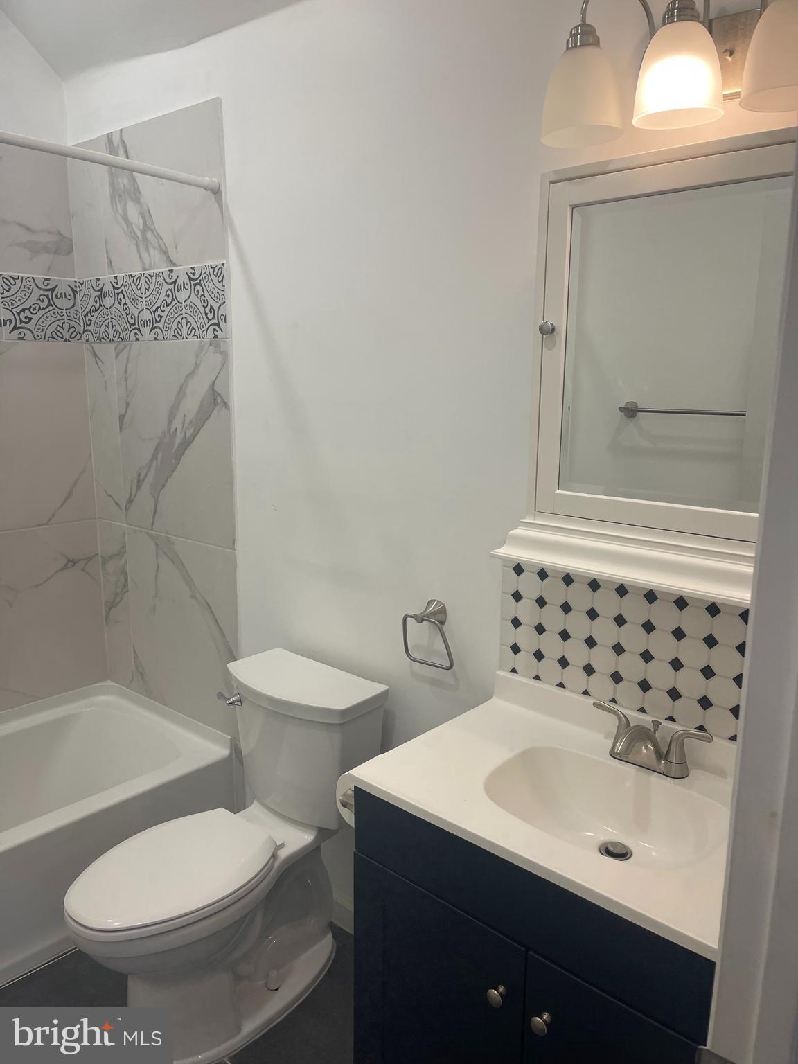 230 North 3rd Street Columbia, PA 17512 - Photo 4 of 15 a bathroom with a sink toilet and shower