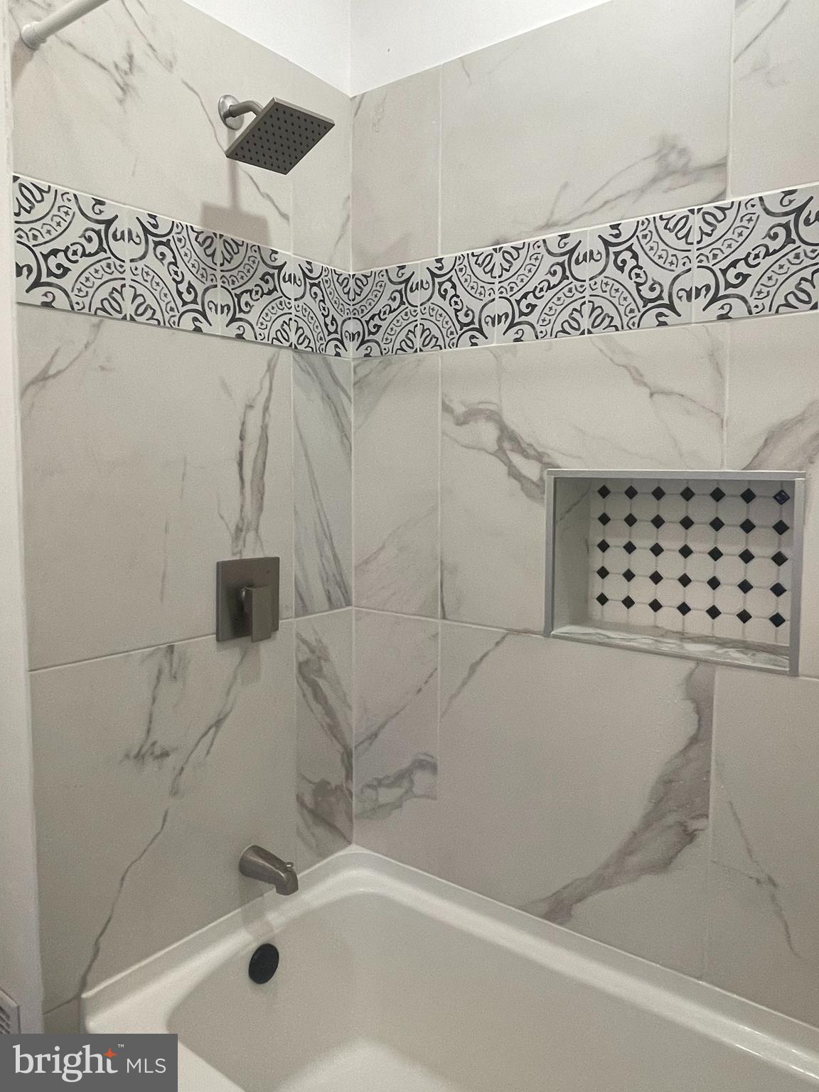 230 North 3rd Street Columbia, PA 17512 - Photo 5 of 15 a bathroom with a bathtub and shower