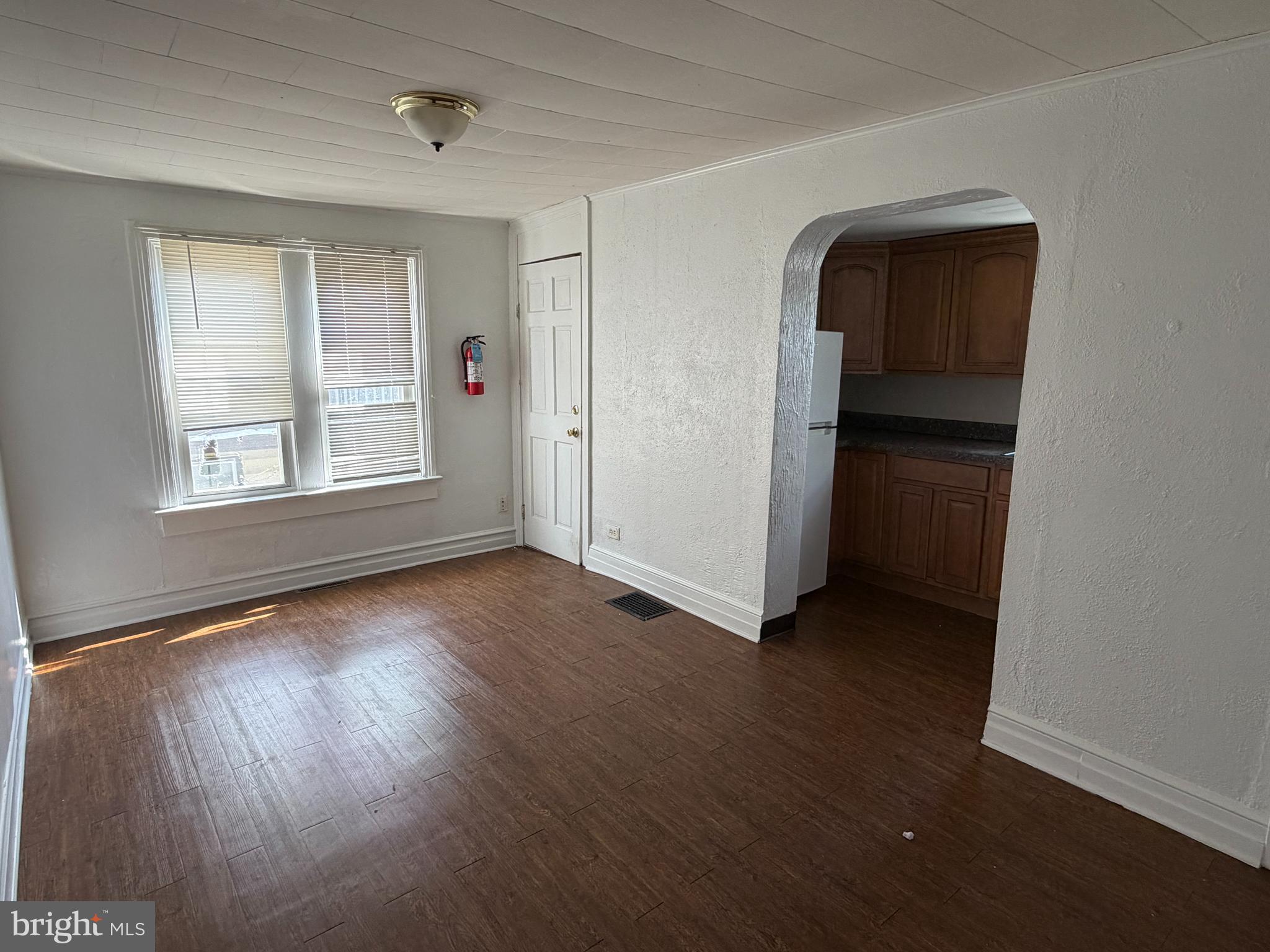230 North 3rd Street Columbia, PA 17512 - Photo 10 of 15 an empty room with wooden floor and windows