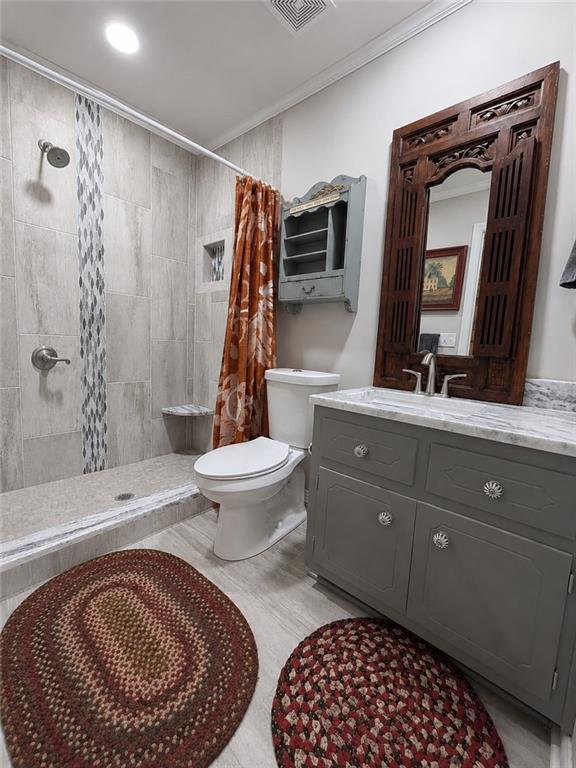 225 Pineridge Road Bogart, GA 30622 - Photo 7 of 53 a bathroom with a toilet a sink and a bathtub