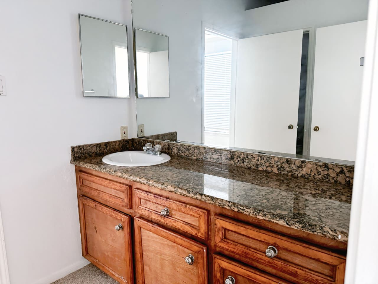 2121 El Paseo Street, Unit 1801 Houston, TX 77054 - Photo 6 of 12 a bathroom with a sink and a mirror