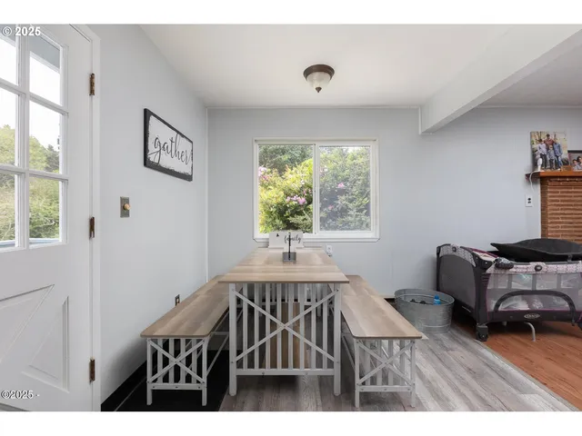 a view of a livingroom with furniture and window