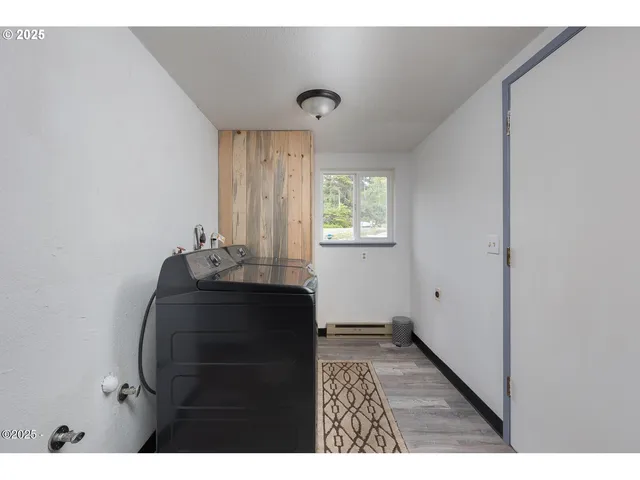 a room with window and tub