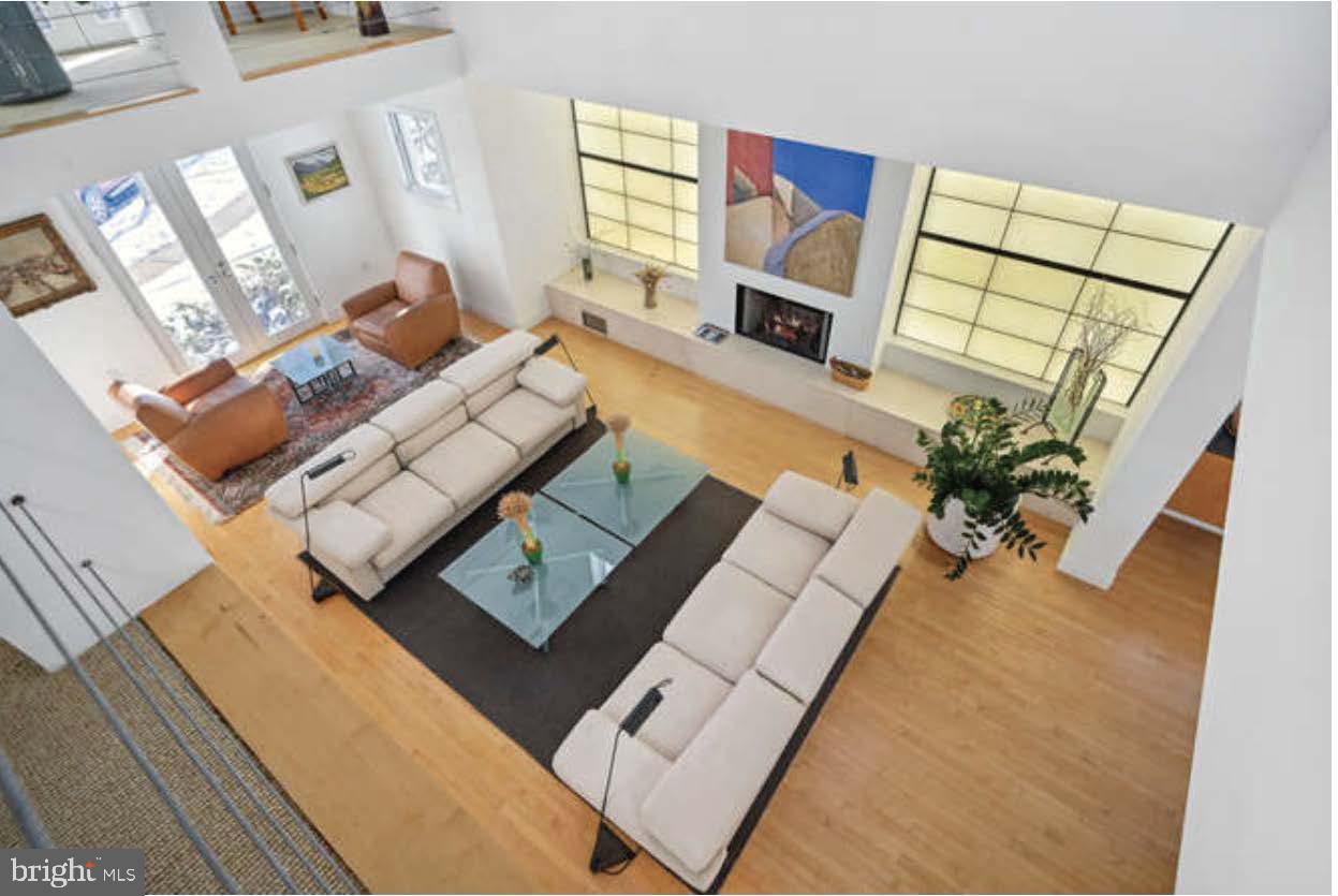 4527 Q Place Northwest Washington, DC 20007 - Photo 14 of 54 a living room with furniture and a flat screen tv