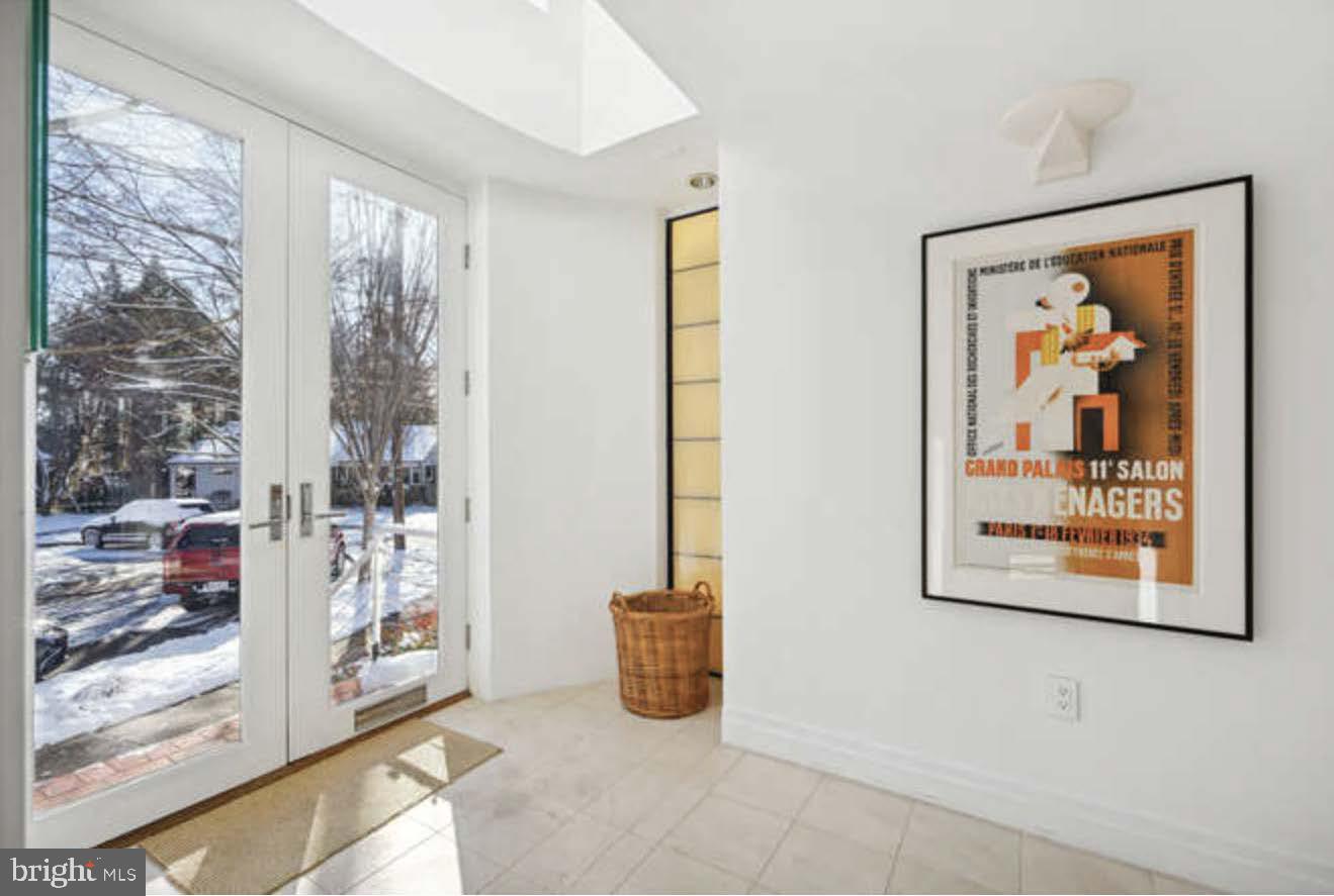 4527 Q Place Northwest Washington, DC 20007 - Photo 20 of 54 a view of a hallway with wooden floor and windows
