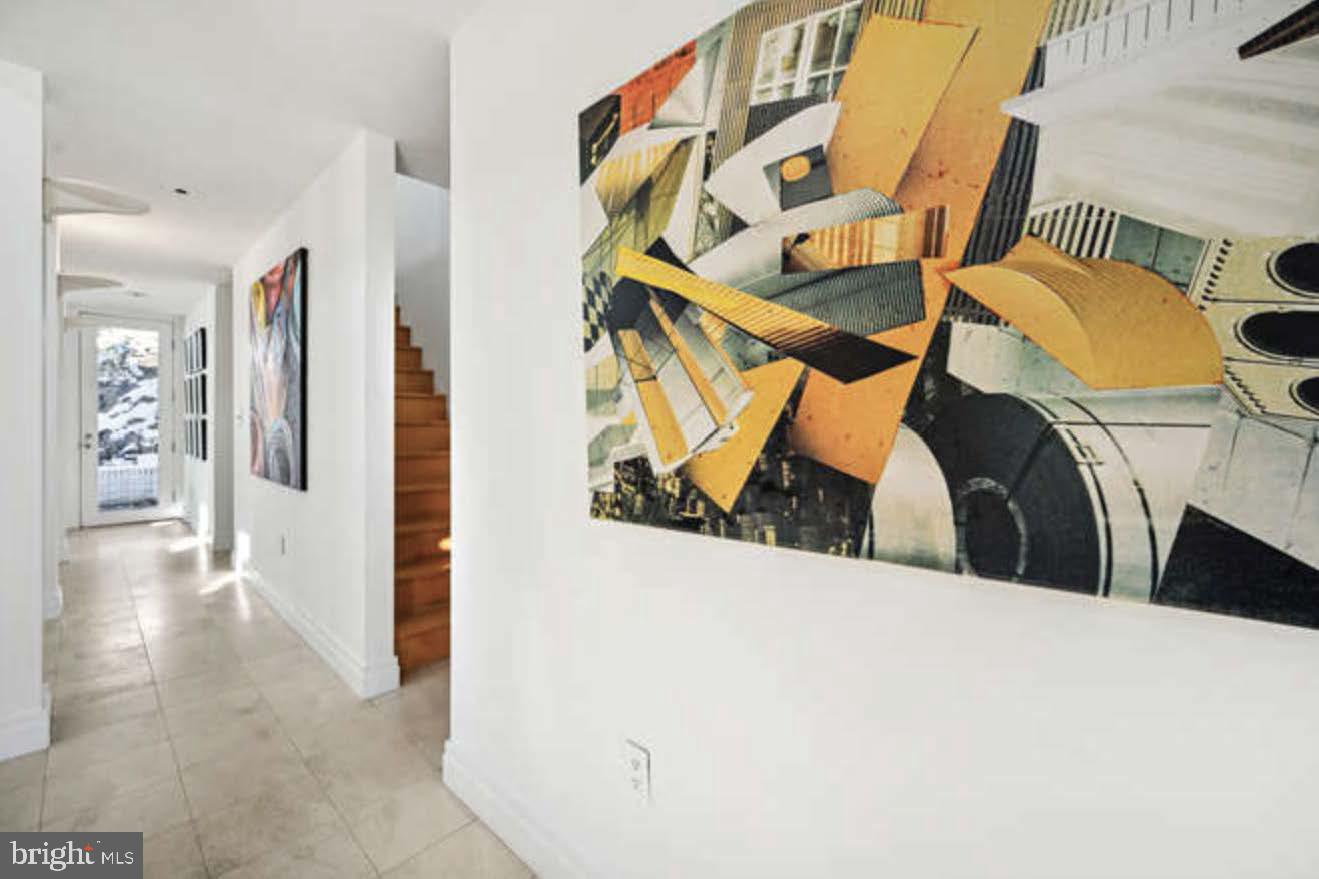 4527 Q Place Northwest Washington, DC 20007 - Photo 26 of 54 a view of walk in closet with clothes and shoes
