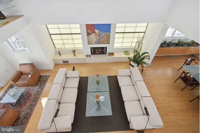 a kitchen with stainless steel appliances granite countertop a sink a stove and a counter space