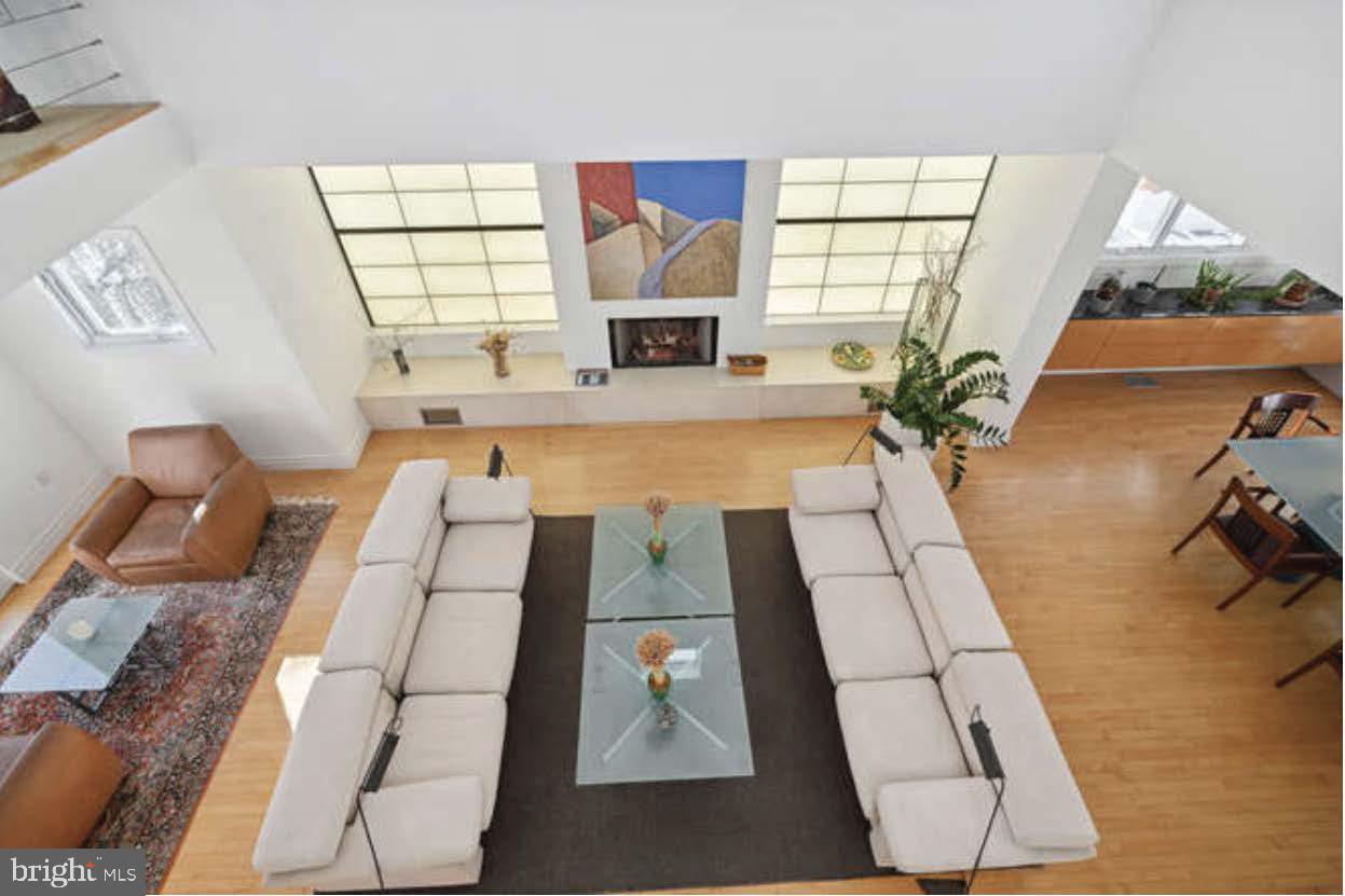 4527 Q Place Northwest Washington, DC 20007 - Photo 28 of 54 a living room with furniture and a large window