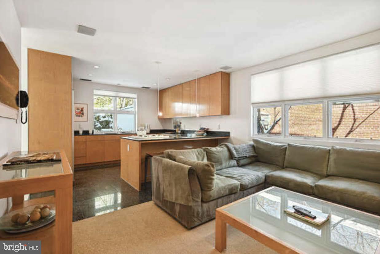 4527 Q Place Northwest Washington, DC 20007 - Photo 31 of 54 a living room with furniture and a large window